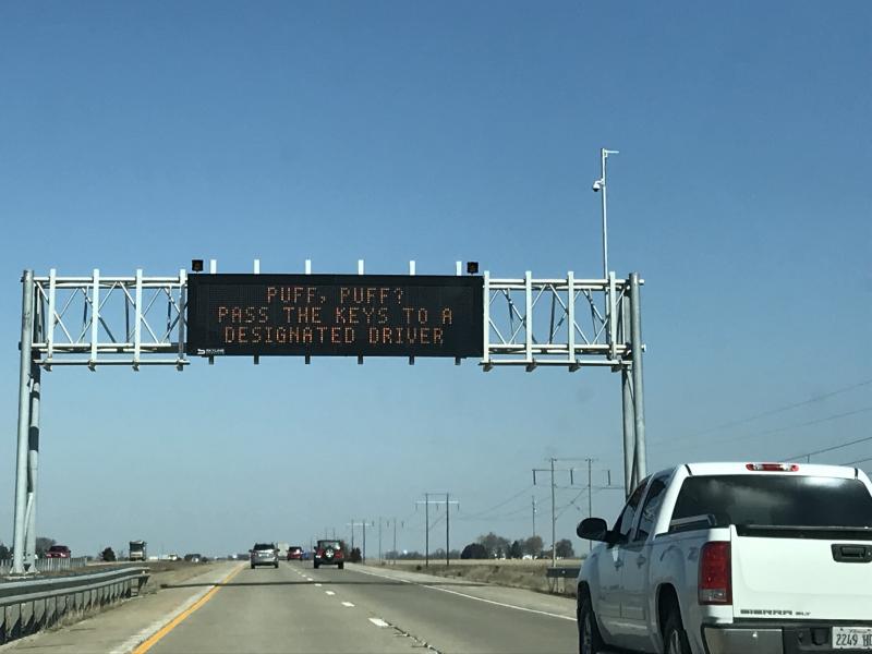 Highway sign that reads, "Puff, puff? Pass the keys to a designated driver." Highway sign that reads, "Puff, puff? Pass the keys to a designated driver."