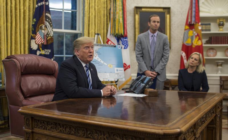 President Trump holds a briefing on Hurricane Florence in the Oval Office on Tuesday with FEMA Administrator Brock Long and Homeland Security Secretary Kirstjen Nielsen. President Trump holds a briefing on Hurricane Florence in the Oval Office on Tuesday with FEMA Administrator Brock Long and Homeland Security Secretary Kirstjen Nielsen.
