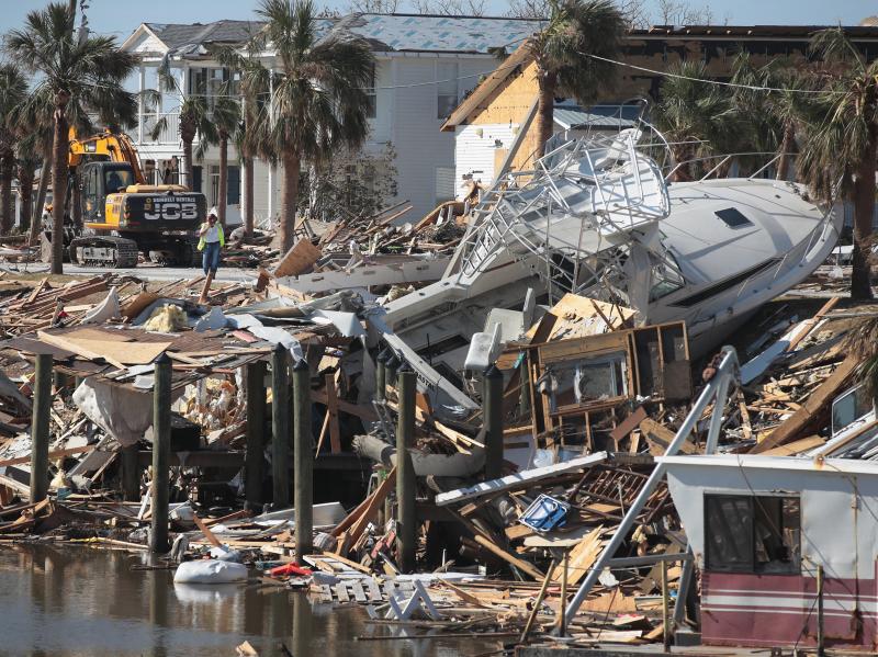 Debris from Hurricane Michael rests along a canal on Oct. 18, 2018, in Mexico Beach, Fla. NOAA upgraded the storm to a Category 5 after completing its analysis. Debris from Hurricane Michael rests along a canal on Oct. 18, 2018, in Mexico Beach, Fla. NOAA upgraded the storm to a Category 5 after completing its analysis.