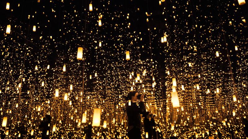 A woman photographs inside the "Aftermath of Obliteration of Eternity" room during a preview of the Yayoi Kusama's "Infinity Mirrors" exhibit at the Hirshhorn Museum on Feb. 21, 2017 in Washington, D.C. A woman photographs inside the "Aftermath of Obliteration of Eternity" room during a preview of the Yayoi Kusama's "Infinity Mirrors" exhibit at the Hirshhorn Museum on Feb. 21, 2017 in Washington, D.C.