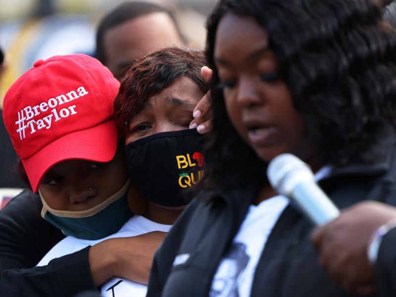 "You didn't just rob me and my family, you robbed the world of a queen," Breonna Taylor's mother, Tamika Palmer, said in a statement read aloud Friday by Palmer's sister, Bianca Austin. In this photo, Ju'Niyah Palmer is seen wiping away tears from her mot "You didn't just rob me and my family, you robbed the world of a queen," Breonna Taylor's mother, Tamika Palmer, said in a statement read aloud Friday by Palmer's sister, Bianca Austin. In this photo, Ju'Niyah Palmer is seen wiping away tears from her mot