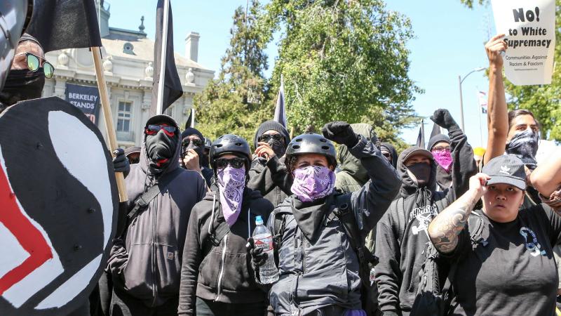 Antifa members and counterprotesters gather during a right-wing No-To-Marxism rally Sunday at Martin Luther King Jr. Park in Berkeley, Calif. Antifa members and counterprotesters gather during a right-wing No-To-Marxism rally Sunday at Martin Luther King Jr. Park in Berkeley, Calif.