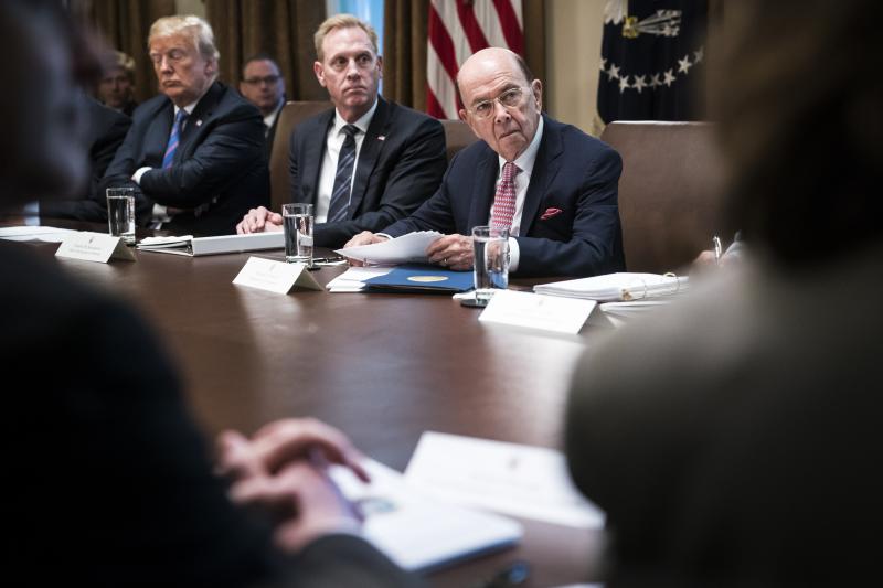Commerce Secretary Wilbur Ross (right), who approved adding a citizenship question to the 2020 census, listens during a cabinet meeting with President Trump in the White House on July 18, in Washington, D.C. Commerce Secretary Wilbur Ross (right), who approved adding a citizenship question to the 2020 census, listens during a cabinet meeting with President Trump in the White House on July 18, in Washington, D.C.