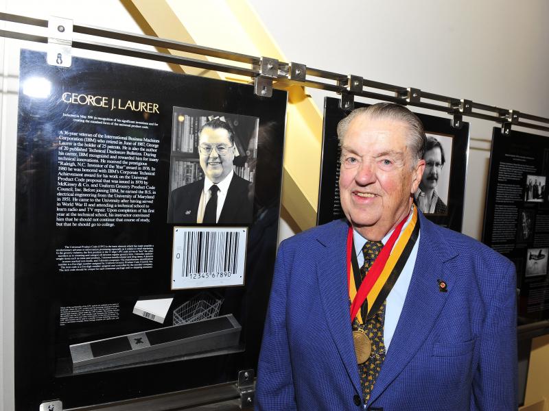 George Laurer in 2011 at the University of Maryland's Innovation Hall of Fame. His many inventions, including the Universal Product Code, led to his induction into the hall in 1991. George Laurer in 2011 at the University of Maryland's Innovation Hall of Fame. His many inventions, including the Universal Product Code, led to his induction into the hall in 1991.