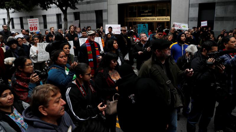 A spokesman for Immigration and Customs Enforcement in San Francisco has resigned, citing disagreements over how to cast the actions of Oakland Mayor Libby Schaaf, who warned against immigration raids last month. The raids prompted a rally outside the ICE A spokesman for Immigration and Customs Enforcement in San Francisco has resigned, citing disagreements over how to cast the actions of Oakland Mayor Libby Schaaf, who warned against immigration raids last month. The raids prompted a rally outside the ICE