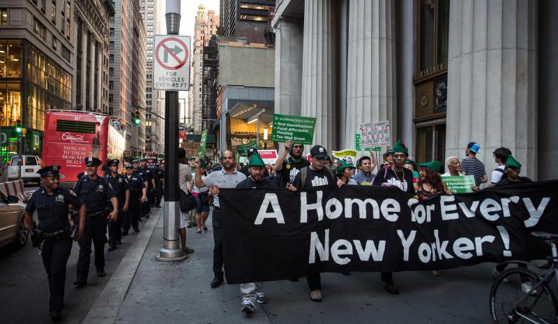 Housing activists march to City Hall to demand more affordable housing options for the homeless and poor on Sept. 17 in New York City. Housing activists march to City Hall to demand more affordable housing options for the homeless and poor on Sept. 17 in New York City.