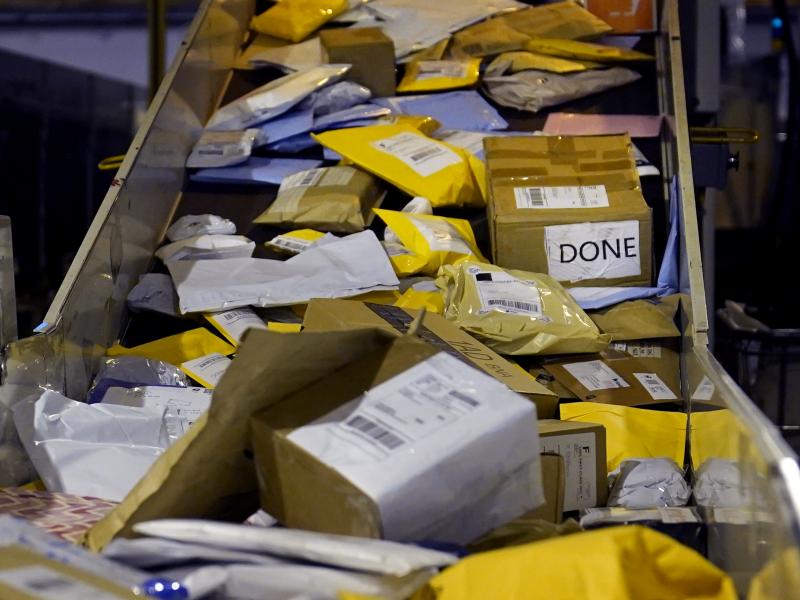 Parcels jam a conveyor belt at the United States Postal Service sorting and processing facility in Boston. Parcels jam a conveyor belt at the United States Postal Service sorting and processing facility in Boston.
