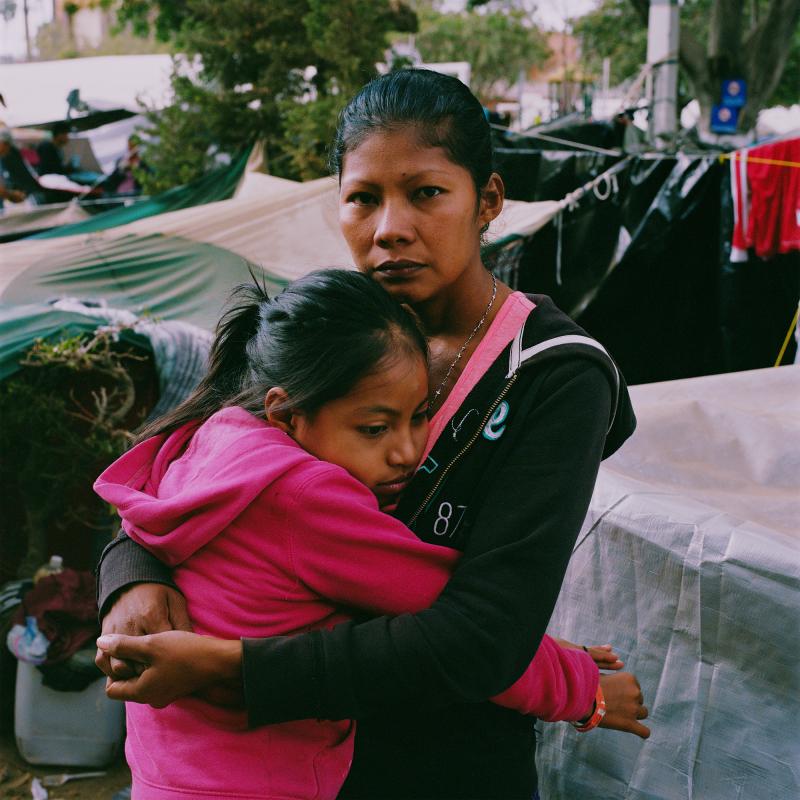 Karen Paz hugs her daughter, Liliana Saray, 9. They are from San Pedro Sula, Honduras. "I feel free; I feel different," Paz said. "I don't have someone who imposes his views and his ways on me. I am not scared someone will come and attack me, like I used Karen Paz hugs her daughter, Liliana Saray, 9. They are from San Pedro Sula, Honduras. "I feel free; I feel different," Paz said. "I don't have someone who imposes his views and his ways on me. I am not scared someone will come and attack me, like I used