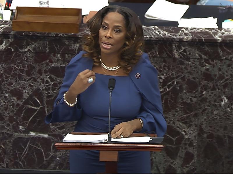 House impeachment manager Del. Stacey Plaskett, D-Virgin Islands, drew a stark comparison between the Americans who "sacrificed their lives for love of country, honor, duty" by stopping foreign terrorists from striking the Capitol on 9/11, and the insurge House impeachment manager Del. Stacey Plaskett, D-Virgin Islands, drew a stark comparison between the Americans who "sacrificed their lives for love of country, honor, duty" by stopping foreign terrorists from striking the Capitol on 9/11, and the insurge