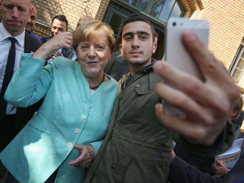 Anas Modamani, a refugee from Syria who posed for a selfie with German Chancellor Angela Merkel in 2015, sued Facebook after his photo was shared in posts falsely accusing him of being a criminal and terrorist. This week, he lost his case in court. Some l Anas Modamani, a refugee from Syria who posed for a selfie with German Chancellor Angela Merkel in 2015, sued Facebook after his photo was shared in posts falsely accusing him of being a criminal and terrorist. This week, he lost his case in court. Some l