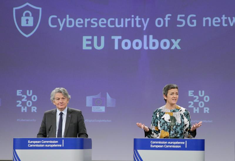 Two European Commission officials, Thierry Breton (left) and Margrethe Vestager (right), give a press conference on 5G security Wednesday in Brussels. The EU recommended that member states screen telecom firms, but did not call for banning any by name. Th Two European Commission officials, Thierry Breton (left) and Margrethe Vestager (right), give a press conference on 5G security Wednesday in Brussels. The EU recommended that member states screen telecom firms, but did not call for banning any by name. Th