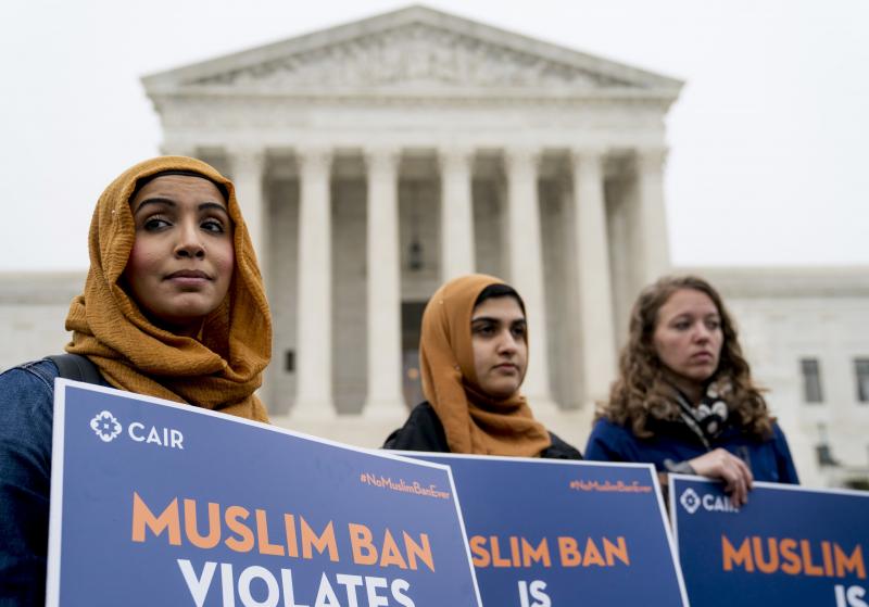 Zainab Chaudry (from left), Zainab Arain and Megan Fair with the Council on American-Islamic Relations, stand outside of the Supreme Court for an anti-Trump travel ban rally before oral arguments. Zainab Chaudry (from left), Zainab Arain and Megan Fair with the Council on American-Islamic Relations, stand outside of the Supreme Court for an anti-Trump travel ban rally before oral arguments.