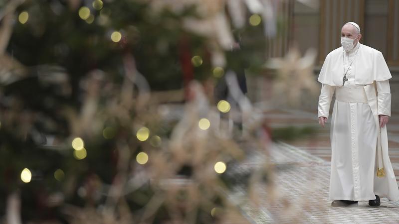 Pope Francis arrives to deliver his Christmas Day message, Urbi et Orbi, in the Apostolic Palace in Vatican City. Pope Francis arrives to deliver his Christmas Day message, Urbi et Orbi, in the Apostolic Palace in Vatican City.
