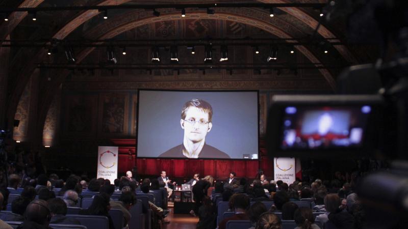 Journalist Barton Gellman's new book, Dark Mirror, focuses on his complicated working relationship with Edward Snowden, the former National Security Agency contractor who leaked the agency's secret surveillance programs. Here, Snowden, who has lived in Mo Journalist Barton Gellman's new book, Dark Mirror, focuses on his complicated working relationship with Edward Snowden, the former National Security Agency contractor who leaked the agency's secret surveillance programs. Here, Snowden, who has lived in Mo
