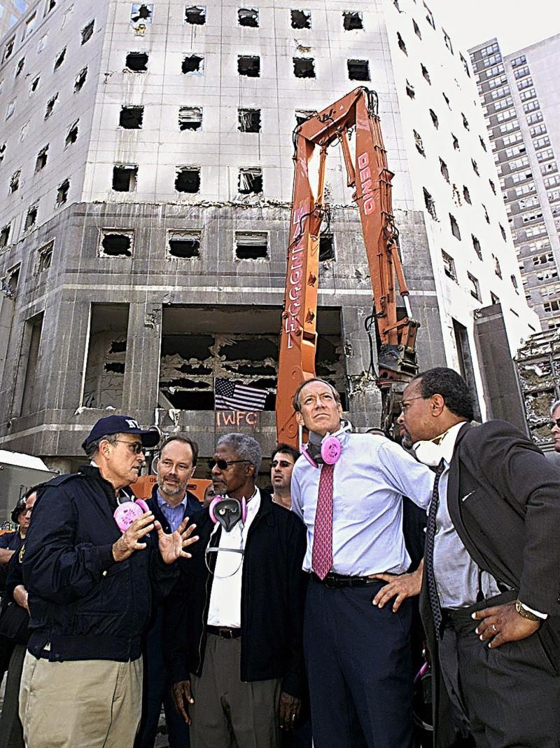 New York Mayor Rudy Giuliani (from left) gives a tour of the World Trade Center site to U.N. Secretary-General Kofi Annan and New York Gov. George Pataki a week after the Sept. 11, 2001, attacks. New York Mayor Rudy Giuliani (from left) gives a tour of the World Trade Center site to U.N. Secretary-General Kofi Annan and New York Gov. George Pataki a week after the Sept. 11, 2001, attacks.