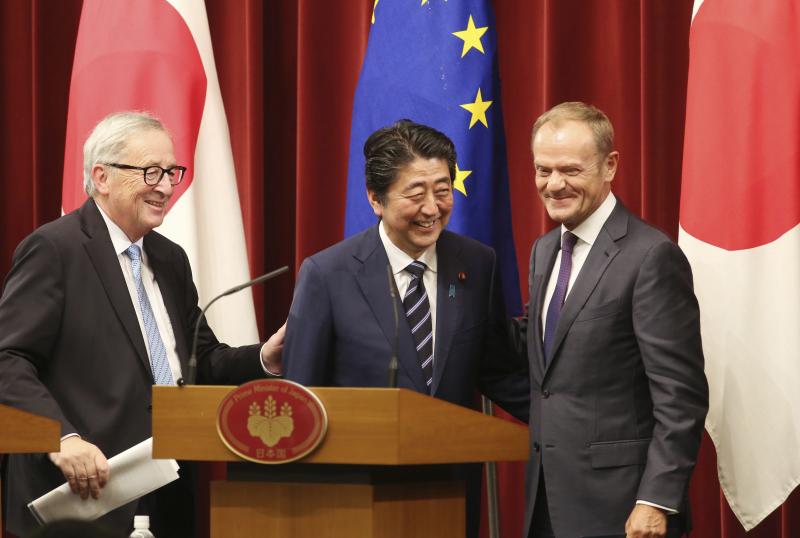 European Commission President Jean-Claude Juncker (from left), Japanese Prime Minister Shinzo Abe and European Council President Donald Tusk conclude their news conference at the Japan-EU summit on Tuesday in Tokyo. European Commission President Jean-Claude Juncker (from left), Japanese Prime Minister Shinzo Abe and European Council President Donald Tusk conclude their news conference at the Japan-EU summit on Tuesday in Tokyo.