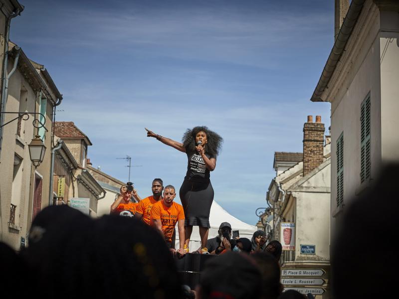 Assa Traoré addresses a crowd during a demonstration in Persan, France, to commemorate the fourth anniversary of her brother Adama Traoré's death. "The fight for justice for Adama belongs to all of France," she says. Assa Traoré addresses a crowd during a demonstration in Persan, France, to commemorate the fourth anniversary of her brother Adama Traoré's death. "The fight for justice for Adama belongs to all of France," she says.
