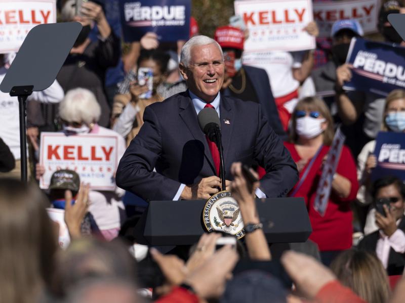 Vice President Mike Pence speaks during a rally Friday in Canton, Ga., where he vowed: "We're going to keep fighting until every legal vote is counted. We're going to keep fighting until every illegal vote is thrown out." Vice President Mike Pence speaks during a rally Friday in Canton, Ga., where he vowed: "We're going to keep fighting until every legal vote is counted. We're going to keep fighting until every illegal vote is thrown out."