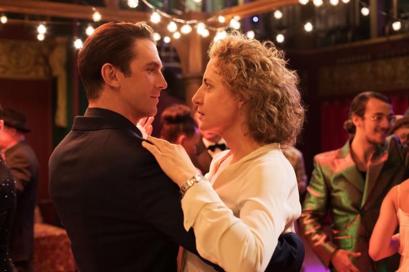 Tom (Dan Stevens) whisks a very skeptical Alma (Maren Eggert) around the dance floor as his precision-tooled algorithm tries to meet her every requirement for the perfect man. Tom (Dan Stevens) whisks a very skeptical Alma (Maren Eggert) around the dance floor as his precision-tooled algorithm tries to meet her every requirement for the perfect man.