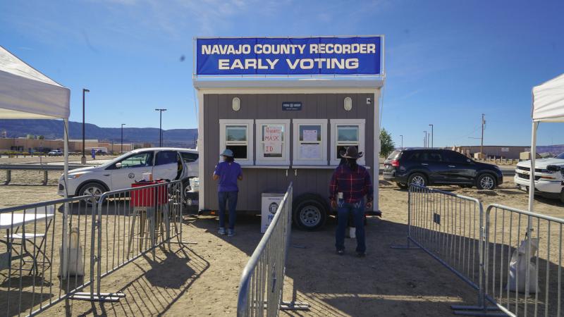 Navajo voters casting their ballots after riding 10 miles on horseback through Navajo County, Ariz. Navajo voters casting their ballots after riding 10 miles on horseback through Navajo County, Ariz.
