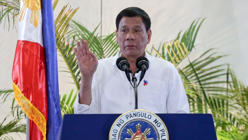 Philippine President Rodrigo Duterte, shown at a news conference at Davao's international airport on Dec. 17, says family planning is critical for reducing poverty. Philippine President Rodrigo Duterte, shown at a news conference at Davao's international airport on Dec. 17, says family planning is critical for reducing poverty.