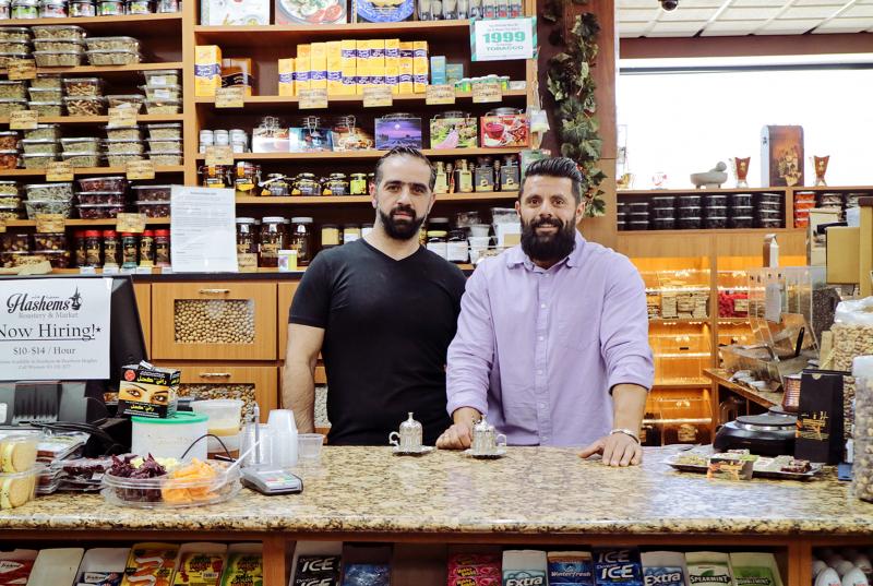 Adam Hashem and Ali Alaoieh greet customers as they enter Hashem's Market & Roaster, a family-owned business specializing in fresh, imported spices and traditional Turkish coffee. Adam Hashem and Ali Alaoieh greet customers as they enter Hashem's Market & Roaster, a family-owned business specializing in fresh, imported spices and traditional Turkish coffee.