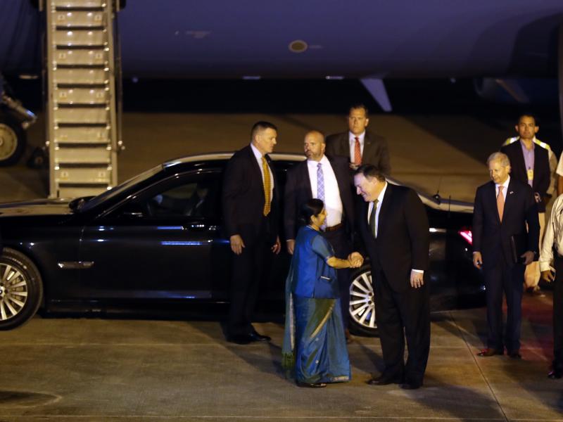 Secretary of State Mike Pompeo is greeted by Indian External Affairs Minister Sushma Swaraj on his arrival at the airport in New Delhi on Wednesday. Secretary of State Mike Pompeo is greeted by Indian External Affairs Minister Sushma Swaraj on his arrival at the airport in New Delhi on Wednesday.
