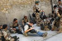 Michael Ware takes notes while reporting with the U.S. military in Iraq. Michael Ware takes notes while reporting with the U.S. military in Iraq.