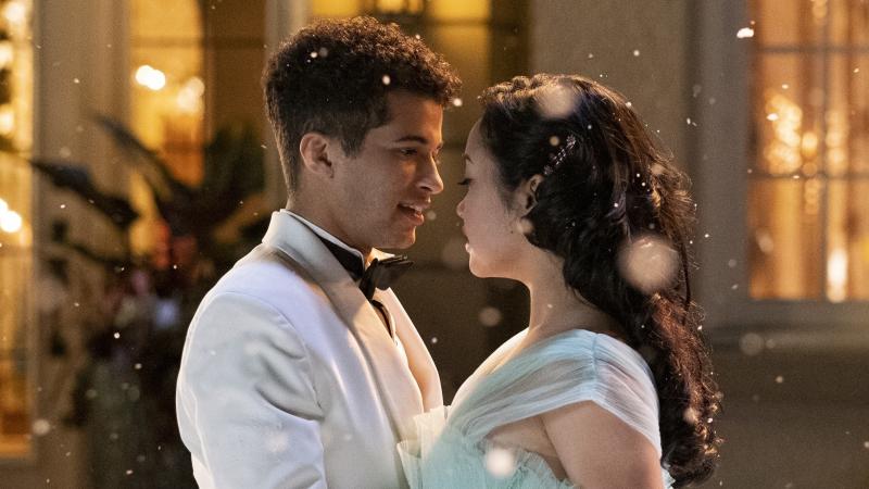 Wait a minute, that's Lara Jean, but that's not Peter Kavinsky! (Jordan Fisher and Lana Condor play John Ambrose and Lara Jean Song Covey.) Wait a minute, that's Lara Jean, but that's not Peter Kavinsky! (Jordan Fisher and Lana Condor play John Ambrose and Lara Jean Song Covey.)
