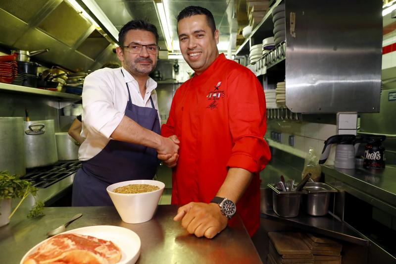 French chef Stephane Jégo (left) poses with Syrian refugee chef Mohammad El Khaldy before the Refugees Food Festival held in Paris in June. French chef Stephane Jégo (left) poses with Syrian refugee chef Mohammad El Khaldy before the Refugees Food Festival held in Paris in June.