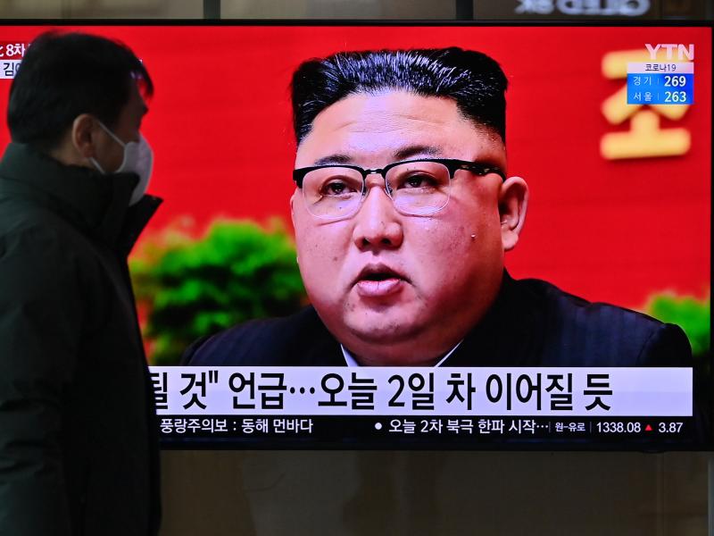 A man watches a television screen at a railway station in Seoul on Wednesday showing news footage of North Korean leader Kim Jong Un attending the 8th Congress of the ruling Workers' Party held in Pyongyang. A man watches a television screen at a railway station in Seoul on Wednesday showing news footage of North Korean leader Kim Jong Un attending the 8th Congress of the ruling Workers' Party held in Pyongyang.