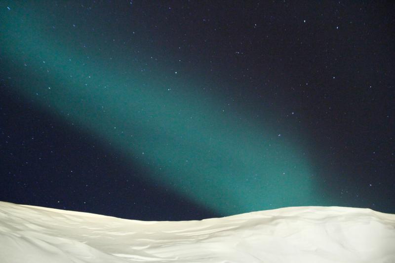 The Northern Lights over the town of Ittoqqortoormiit, Greenland — about 400 miles north of the Arctic Circle. The Northern Lights over the town of Ittoqqortoormiit, Greenland — about 400 miles north of the Arctic Circle.