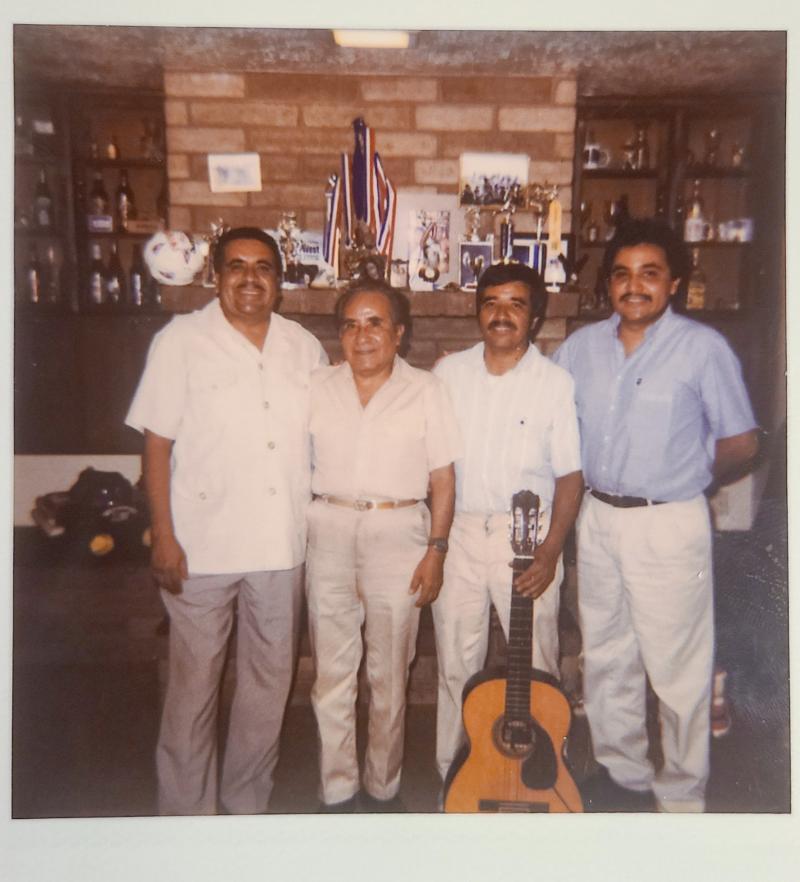 The Aldaco family of Phoenix suffered multiple losses in this year of unfathomable pain. Three brothers perished in the pandemic: Jose (left) in July, Heriberto Jr. (right) in December and Gonzalo (holding guitar) in February. They appear in this undated The Aldaco family of Phoenix suffered multiple losses in this year of unfathomable pain. Three brothers perished in the pandemic: Jose (left) in July, Heriberto Jr. (right) in December and Gonzalo (holding guitar) in February. They appear in this undated