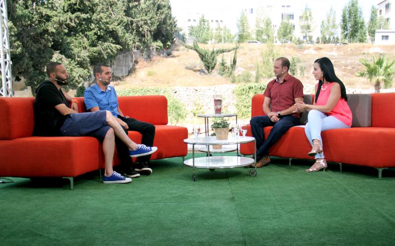 Doraid Liddawi and his co-host, Afaf Shini, interview Palestinian Arab rappers and citizens of Israel on the makeshift Ramallah set of Palestine 48's morning show. Doraid Liddawi and his co-host, Afaf Shini, interview Palestinian Arab rappers and citizens of Israel on the makeshift Ramallah set of Palestine 48's morning show.