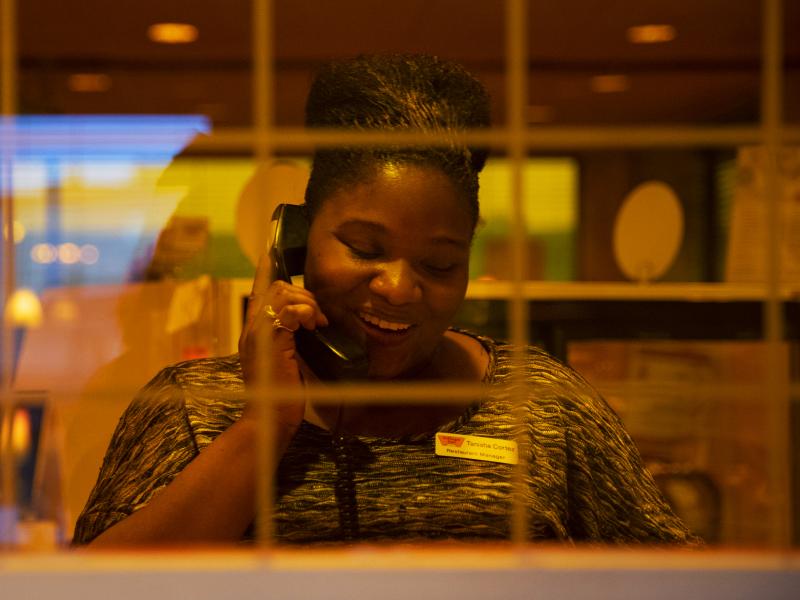 Cortez answers a call from a customer. She's earning $2,000 more a year than she made at her old job. Cortez answers a call from a customer. She's earning $2,000 more a year than she made at her old job.
