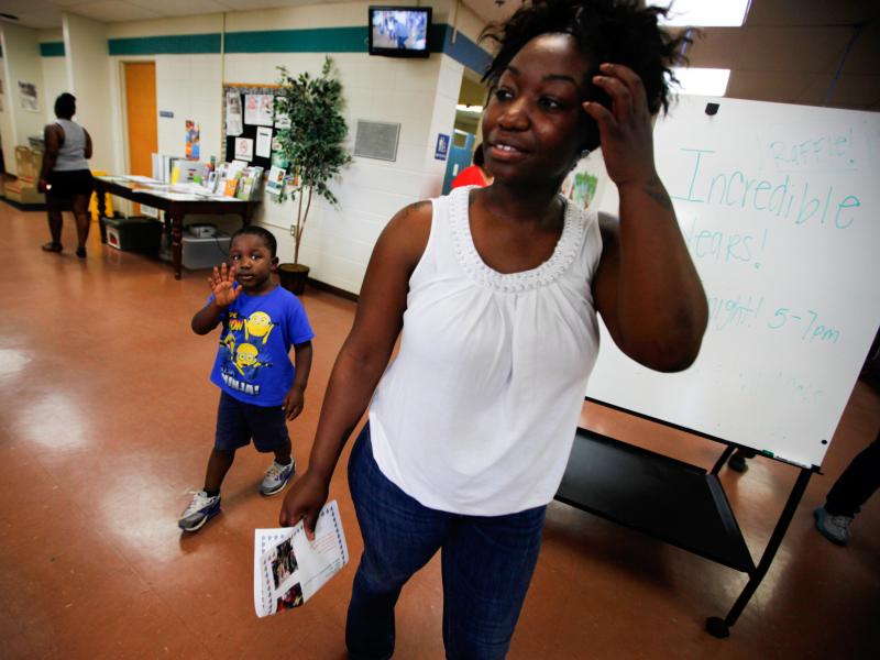 Shartara Wallace picks up her son James, 4, from preschool in Tulsa, Okla. Shartara Wallace picks up her son James, 4, from preschool in Tulsa, Okla.