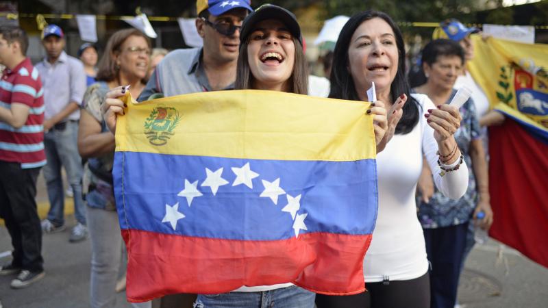 Activists celebrate Sunday in Caracas after voting in an opposition-organized referendum on President Nicolas Maduro's plan to rewrite the country's constitution. Activists celebrate Sunday in Caracas after voting in an opposition-organized referendum on President Nicolas Maduro's plan to rewrite the country's constitution.