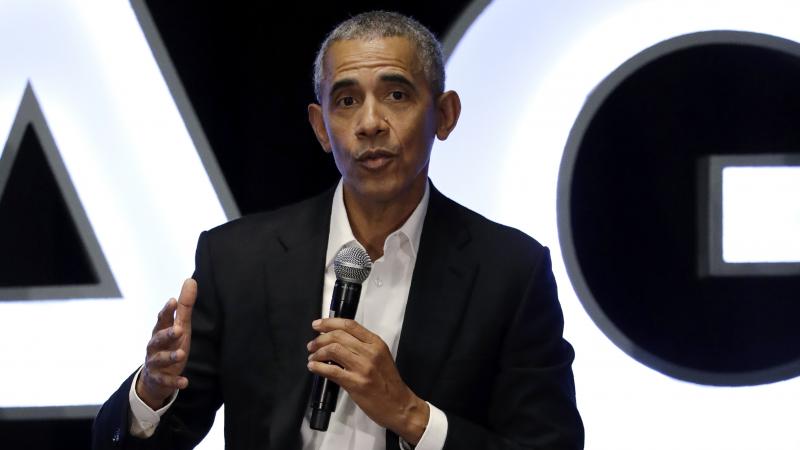 Former President Barack Obama talks during a panel with NBA players in Chicago on Feb. 15. Former President Barack Obama talks during a panel with NBA players in Chicago on Feb. 15.