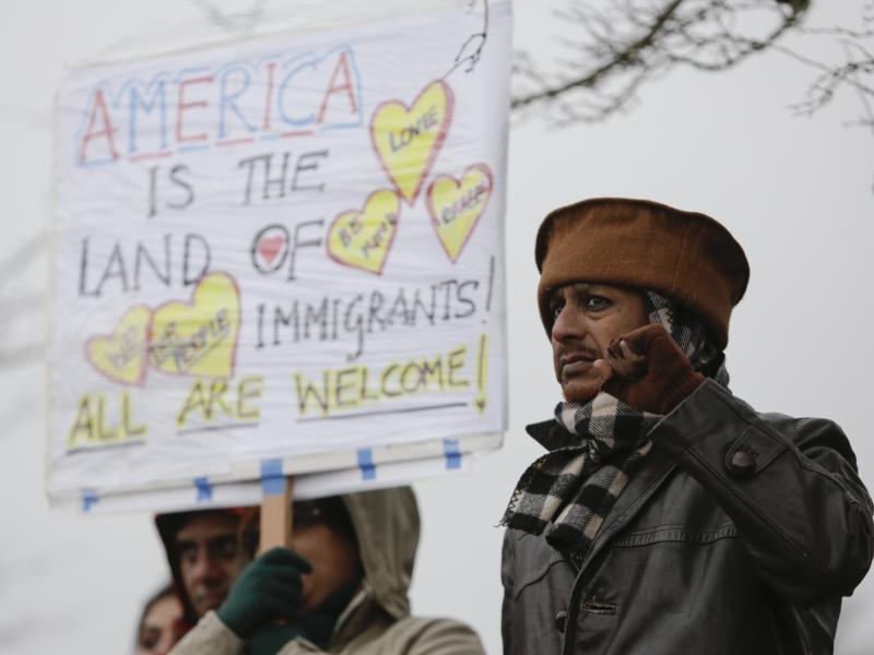 Members of the South Asian community and others attend a peace vigil for Srinivas Kuchibhotla, the 32-year-old Indian engineer killed at a bar Olathe, Kansas, in Bellevue, Washington on March 5, 2017. Members of the South Asian community and others attend a peace vigil for Srinivas Kuchibhotla, the 32-year-old Indian engineer killed at a bar Olathe, Kansas, in Bellevue, Washington on March 5, 2017.