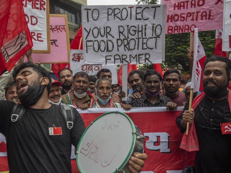 Members of Communist Party of India shout slogans during a protest against farm laws in Mumbai, India Monday, Sept. 27, 2021. The farmers called for a nation-wide strike Monday to mark one year since the legislation was passed, marking a return to protest Members of Communist Party of India shout slogans during a protest against farm laws in Mumbai, India Monday, Sept. 27, 2021. The farmers called for a nation-wide strike Monday to mark one year since the legislation was passed, marking a return to protest