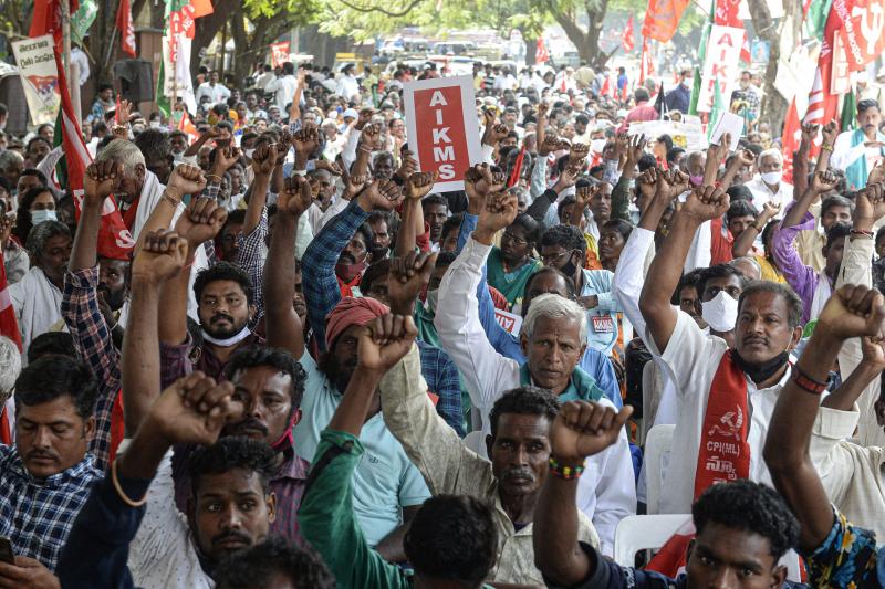 Supporters of All India Kisan Sangharsh Coordination Committee, a group of farmers' organizations, hold flags during a protest to mark one year since the introduction of divisive farm laws and to demand the withdrawal of the Electricity Amendment Bill, in Supporters of All India Kisan Sangharsh Coordination Committee, a group of farmers' organizations, hold flags during a protest to mark one year since the introduction of divisive farm laws and to demand the withdrawal of the Electricity Amendment Bill, in