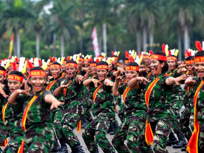 Female soldiers perform martial arts at a ceremony in Jakarta. Women in Indonesia must undergo an invasive "virginity test" to join the military. Female soldiers perform martial arts at a ceremony in Jakarta. Women in Indonesia must undergo an invasive "virginity test" to join the military.