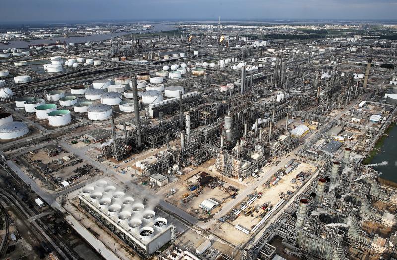 Petrochemical facilities in the Houston area are assessing their hurricane preparedness after Hurricane Harvey. This oil refinery reinforced storage tank roofs with geodesic domes — the gray caps on some of the white tanks in the photo — to better wi Petrochemical facilities in the Houston area are assessing their hurricane preparedness after Hurricane Harvey. This oil refinery reinforced storage tank roofs with geodesic domes — the gray caps on some of the white tanks in the photo — to better wi
