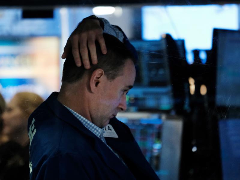A trader works on the floor of the New York Stock Exchange on Oct. 4, 2021, in New York City. Stocks and bonds have tumbled this year as a spike in inflation has investors bracing for higher interest rates. A trader works on the floor of the New York Stock Exchange on Oct. 4, 2021, in New York City. Stocks and bonds have tumbled this year as a spike in inflation has investors bracing for higher interest rates.