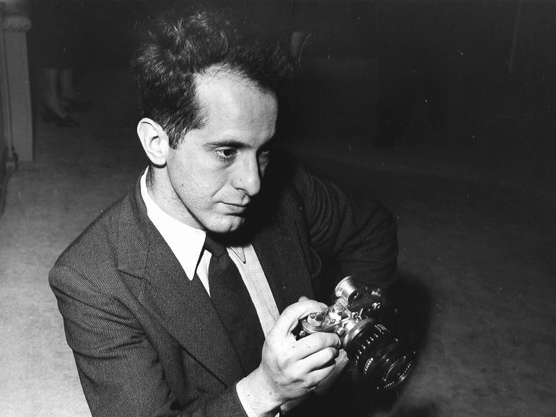 Photographer Robert Frank holds a camera in 1954. His photo book, The Americans, changed the way people saw photography and the way they saw the U.S. Frank died on Monday at the age of 94. Photographer Robert Frank holds a camera in 1954. His photo book, The Americans, changed the way people saw photography and the way they saw the U.S. Frank died on Monday at the age of 94.