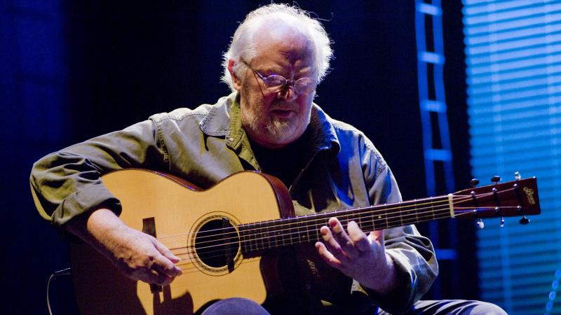 John Renbourn performs onstage at the Royal Festival Hall in London June 29, 2008. The influential guitarist died at his home in Scotland Thursday. He was 70. John Renbourn performs onstage at the Royal Festival Hall in London June 29, 2008. The influential guitarist died at his home in Scotland Thursday. He was 70.