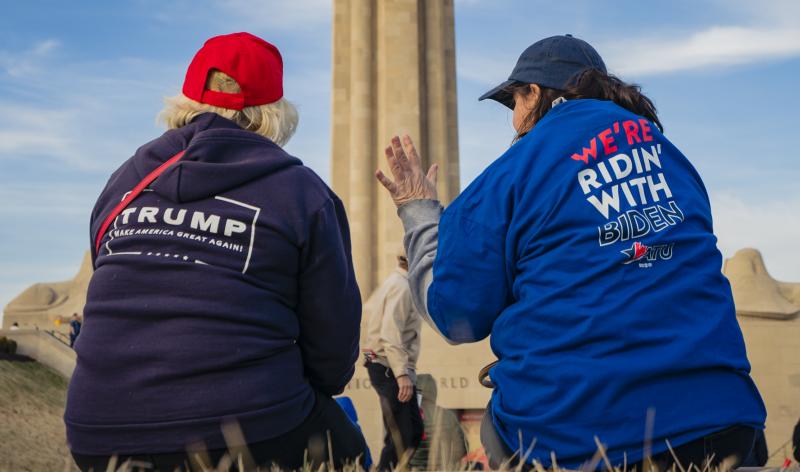 Supporters of President Trump and his Democratic challenger, former Vice President Joe Biden, talk in Kansas City, Mo. Supporters of President Trump and his Democratic challenger, former Vice President Joe Biden, talk in Kansas City, Mo.