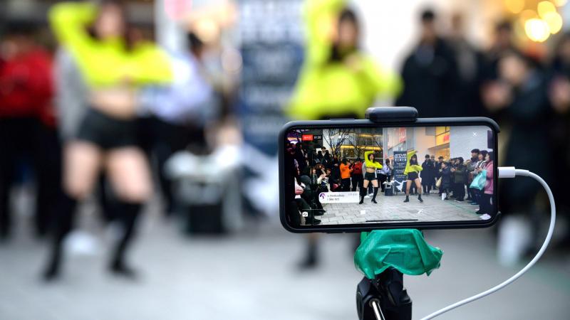 An aspiring K-pop group performs in the Hongdae district of Seoul on Jan. 5, 2020. An aspiring K-pop group performs in the Hongdae district of Seoul on Jan. 5, 2020.