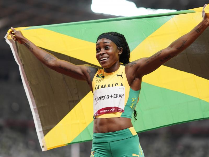 Elaine Thompson-Herah, of Jamaica, reacts after winning the final of the women's 200-meters at the 2020 Summer Olympics, Tuesday, Aug. 3, 2021, in Tokyo. Elaine Thompson-Herah, of Jamaica, reacts after winning the final of the women's 200-meters at the 2020 Summer Olympics, Tuesday, Aug. 3, 2021, in Tokyo.