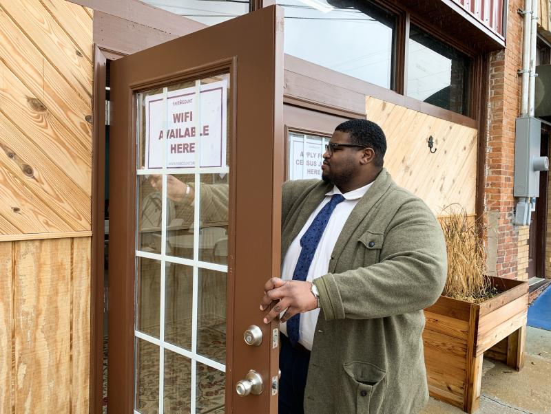 Anthony Hill, Fair Count's communications associate, posts signs encouraging people to use the free Wi-Fi and apply for 2020 census jobs at ARC Community Center in Fort Gaines, Ga. Anthony Hill, Fair Count's communications associate, posts signs encouraging people to use the free Wi-Fi and apply for 2020 census jobs at ARC Community Center in Fort Gaines, Ga.